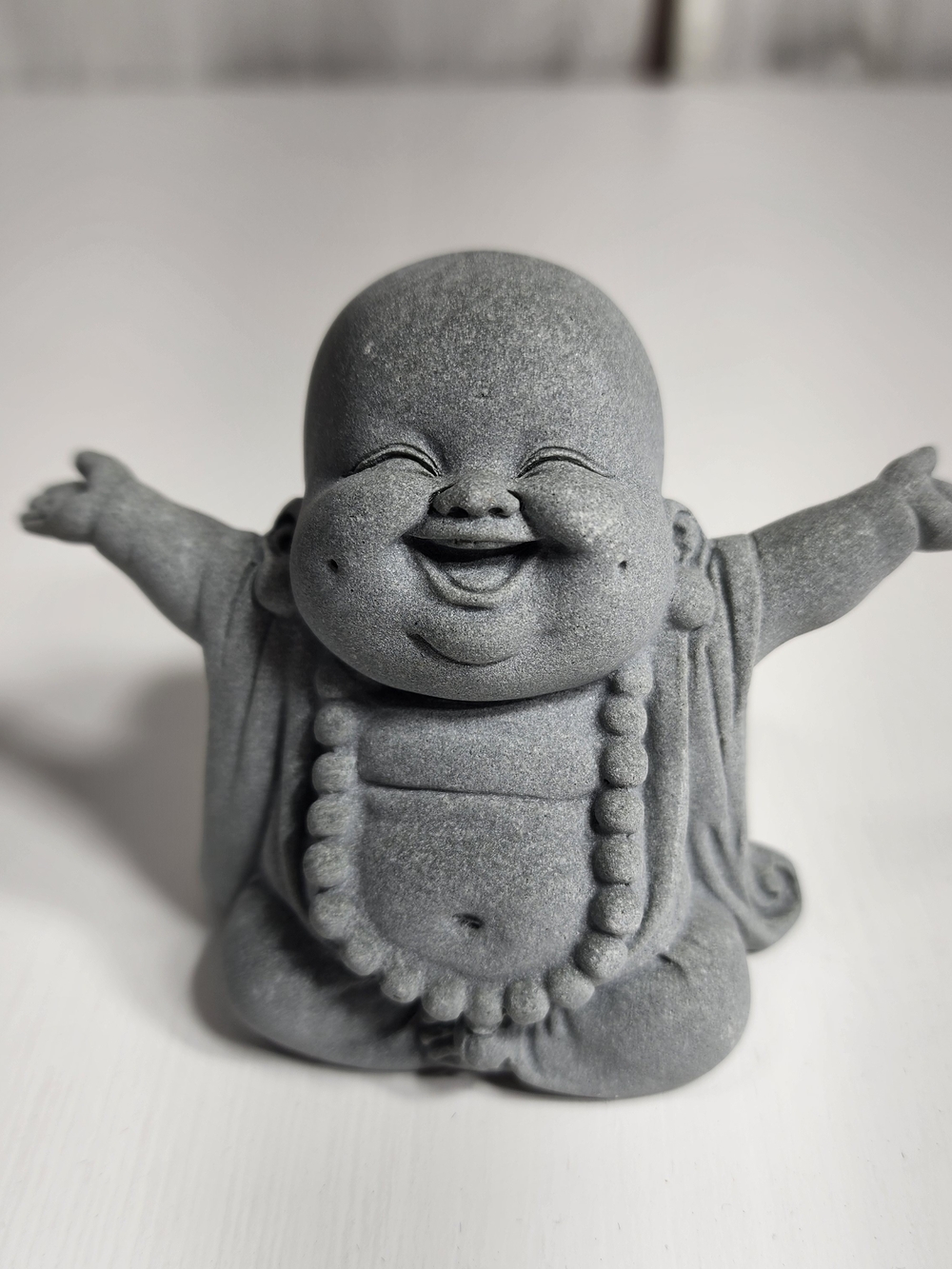 Joyful Buddha Figurine Gray Home Accent